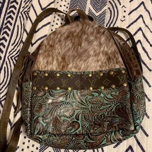 Leather and hide small backpack